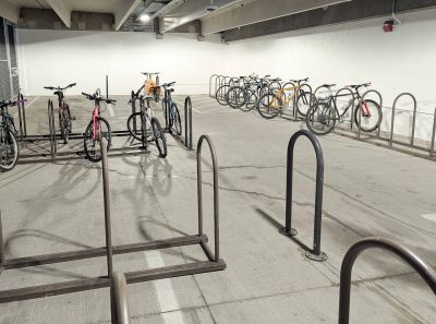 Bike storage in the Perry Street Parking Garage, photo shows bike racks with bikes